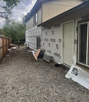 House wrap installed and ready for new siding