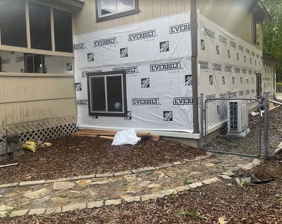Exterior prepped with house wrap before new siding goes on
